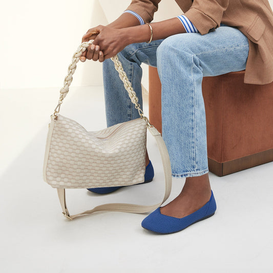 hover | The Shoulder Strap in White, shown paired with The Daily Crossbody, worn by a model and shown from the side.