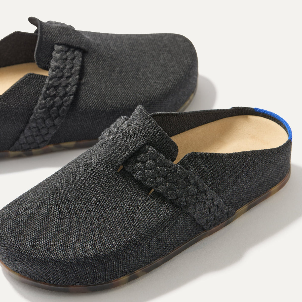 The toe and vamp of The Braid Clog, in diagonal view.