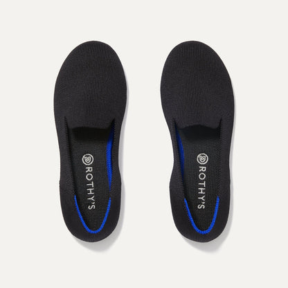 A pair of The Kids slip-on Loafers in Black Solid shown from the top view.