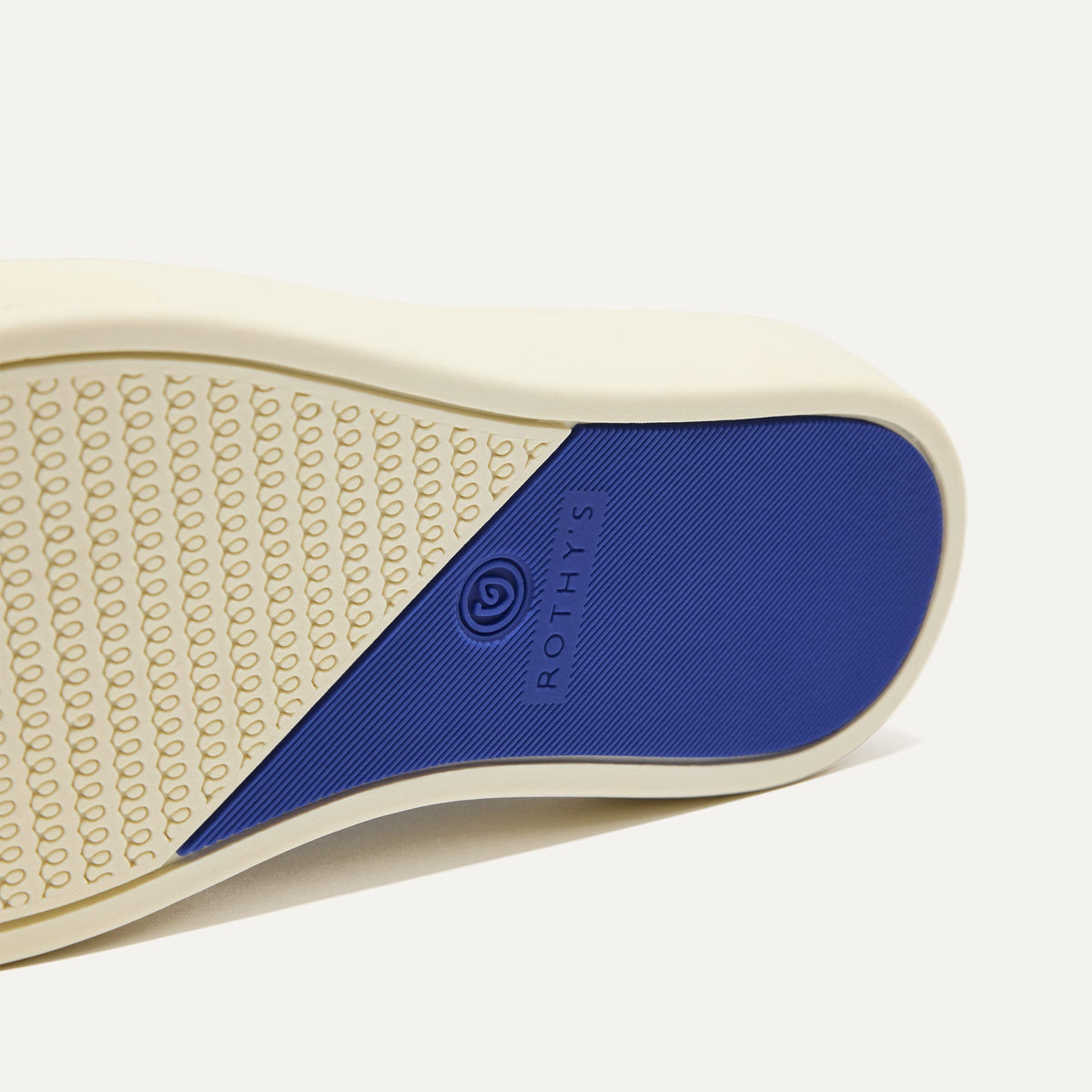 The sole of The Kids Sneaker in Spruce Camo.