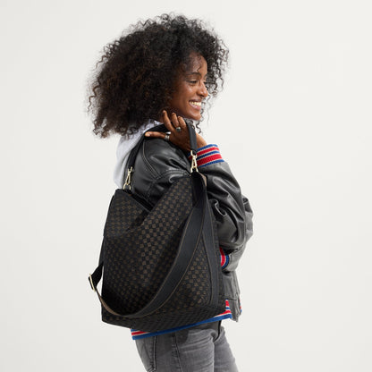 hover | The Bucket Bag in Night Song shown on model.