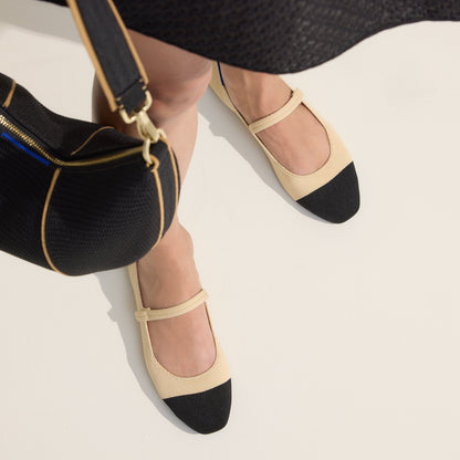 hover | Model wearing The Square Mary Jane in Cream Captoe.
