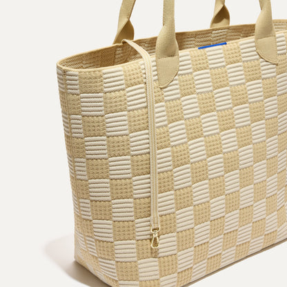 The Lightweight Tote in Checker Sand shown with its handy key leash.
