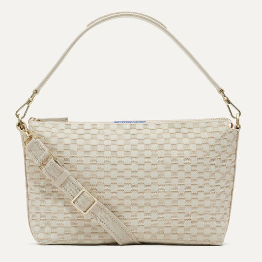 The Daily Crossbody Bag in White Sand shown from the front.