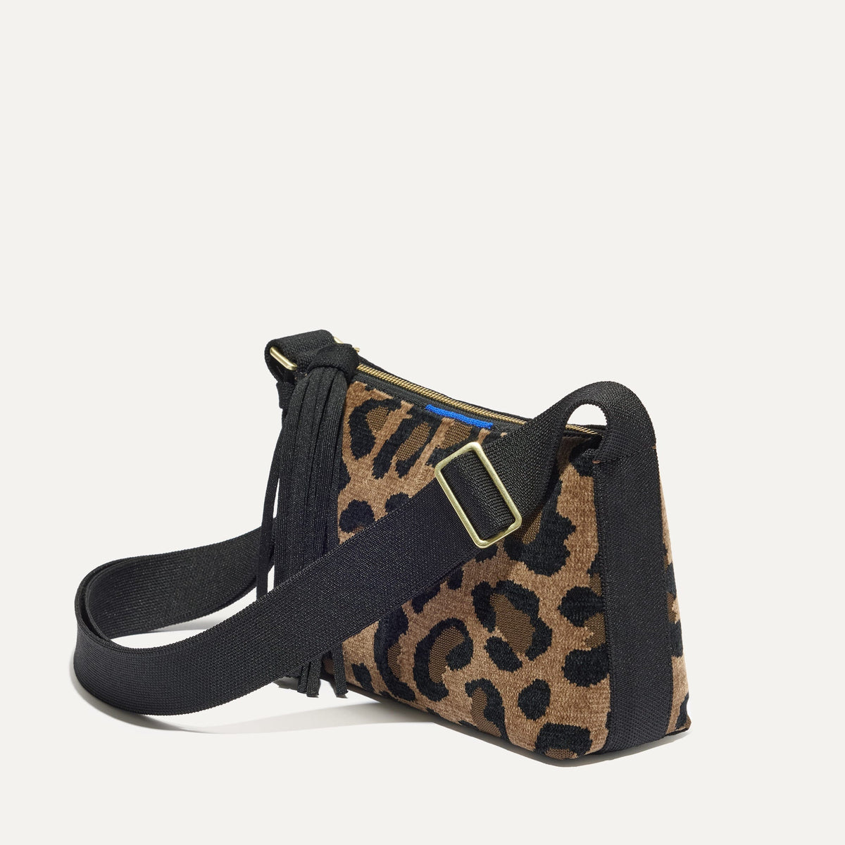 The ReVelvet Casual Crossbody in ReVelvet Cat shown from the side at an angle.