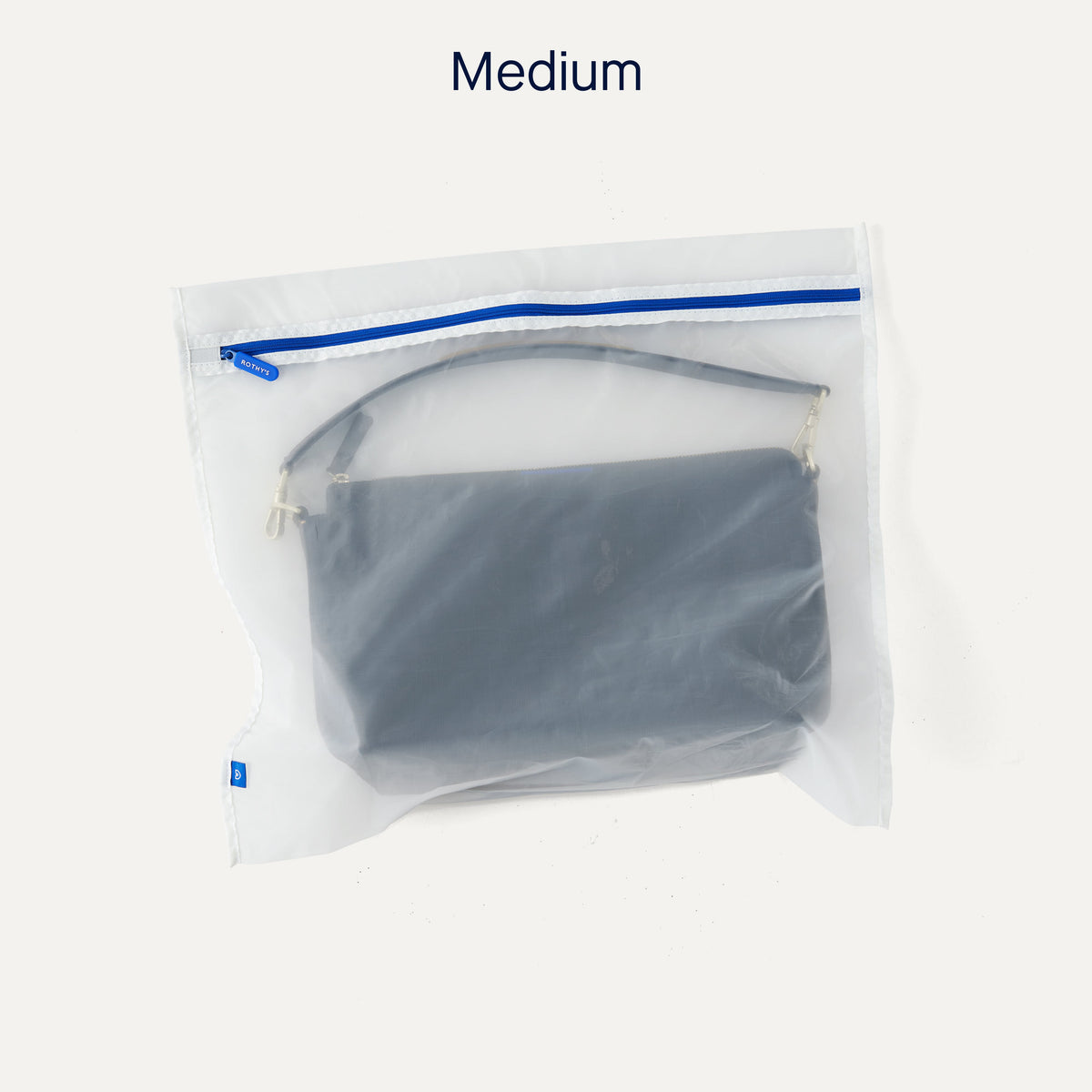 The Easy Wash Bag in Medium with The Daily Crossbody inside.