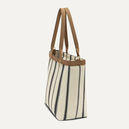 The Lightweight Zip Tote in Coastline, shown from the side.