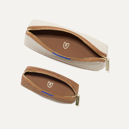 The Vanity Set in Vanilla Wafer shown from the top with zipper closure open.