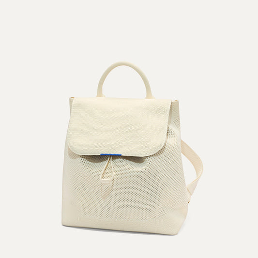 PLP | The Cinch Backpack in Coconut Crochet shown from the front.
