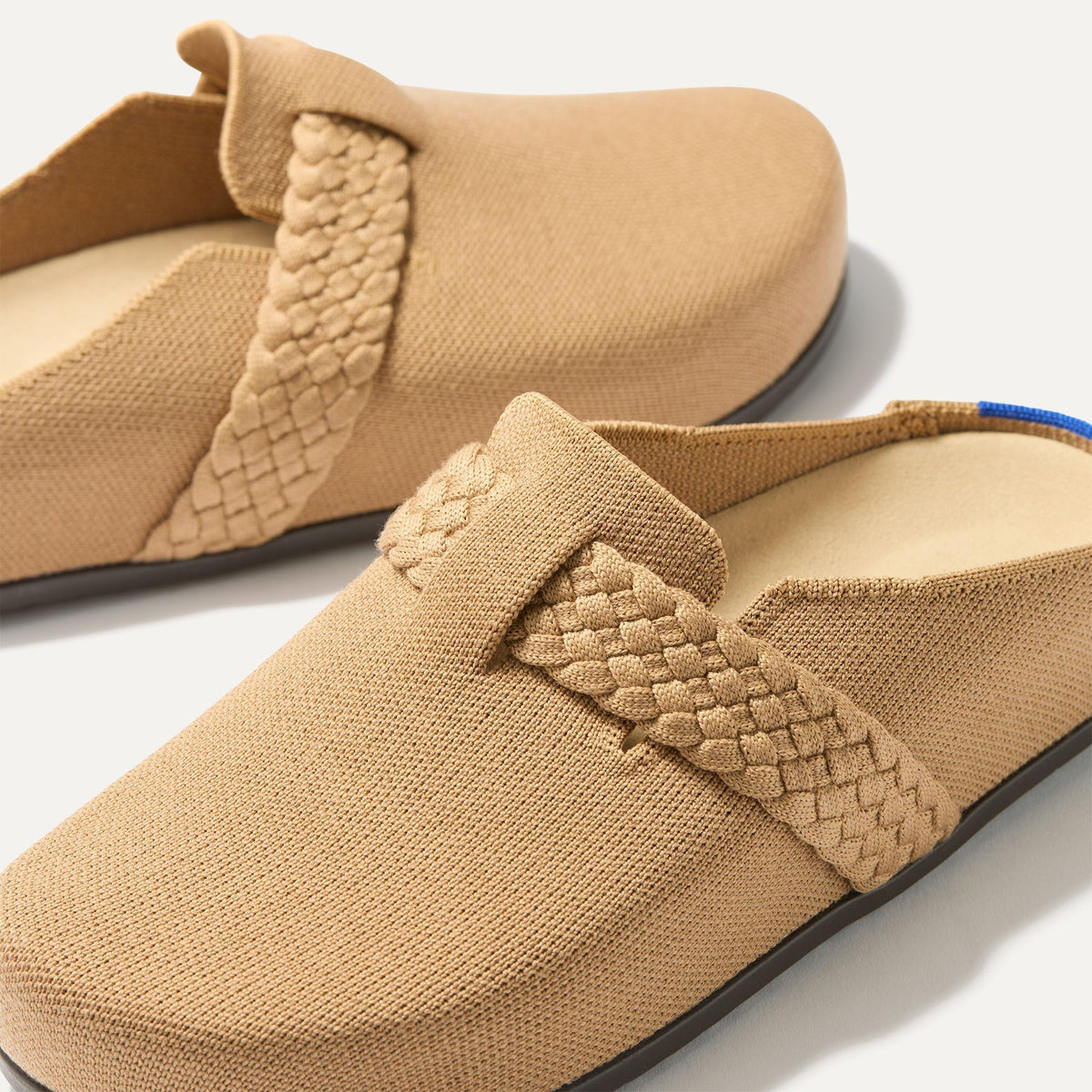 The toe and vamp of The Braid Clog, in diagonal view.